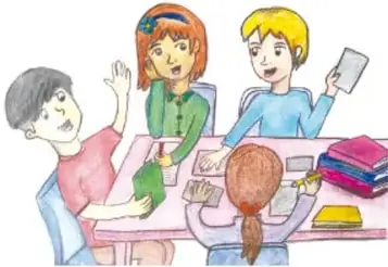 Grupo de niñas y niños reunidos en mesa dialogando y tomando decisiones