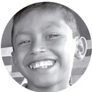 Fotografía de un niño sonriente.