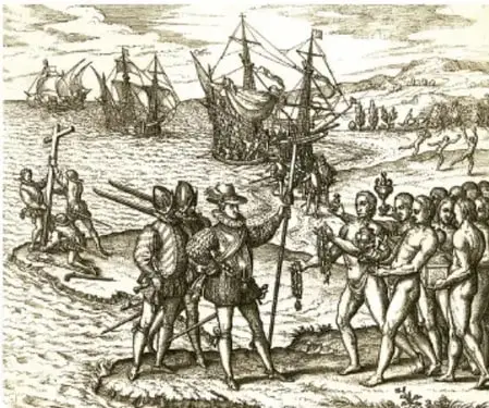 Grabado histórico antiguo que muestra la llegada de los españoles en barcos a una costa de las Antillas: en primer plano, un grupo de conquistadores con armas y estandartes desembarca mientras se encuentran con habitantes nativos; al fondo se ven tres embarcaciones europeas en el mar.