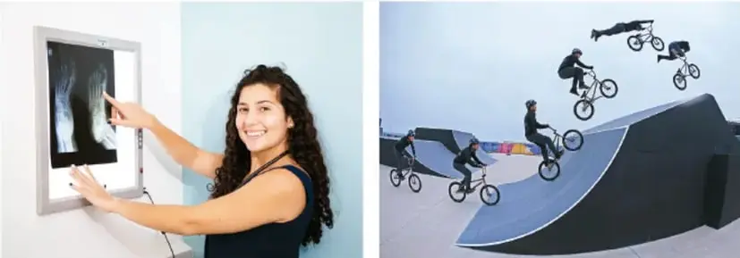 Mujer joven señalando una pantalla digital interactiva con gráficos.