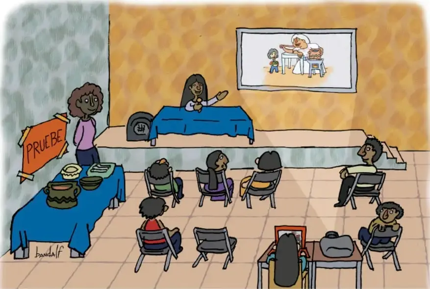 Ilustración de una conferencia comunitaria: una expositora habla frente a un público sentado, hay un cartel que dice 'PRUEBE', una mesa con alimentos y una proyección.