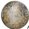 Fotografía del anverso de una moneda circular antigua con bordes festoneados y leyenda circular: Moneda Columnaria, Felipe V, 1 Real.