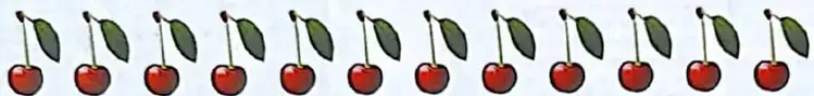Doce cerezas que deben repartirse en tres grupos iguales.