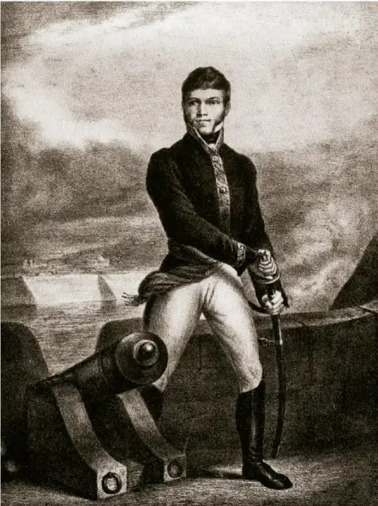 Litografía de 1870 del insurgente Mina (Primitivo Miranda e H. Iriarte), de pie junto a un cañón y con espada, sobre un baluarte; procede de El libro rojo de Riva Palacio y Payno, acervo INEHRM.