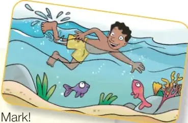 Niño nadando en el mar con peces y corales.