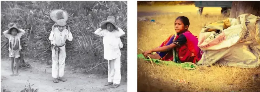 Fotografía en blanco y negro, de tipo histórico, de tres niños del campo con sombreros y ropa de manta cargando bultos de leña o paja al hombro.