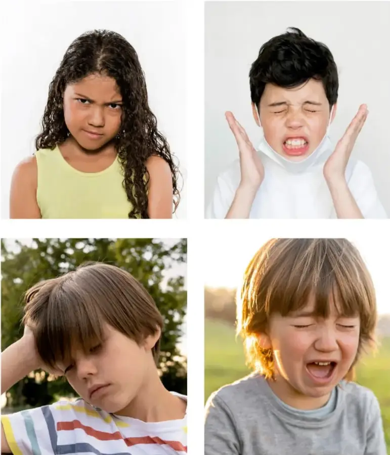 Niña con cabello rizado y playera amarilla, expresión de enojo con ceño fruncido.