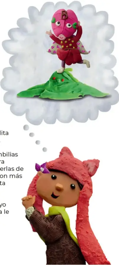 Personaje con casco rosa y traje rojo parado sobre una colina verde, dentro de una nube de pensamiento.