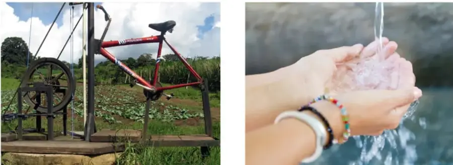 Fotografía de una máquina agrícola construida a partir de partes de una bicicleta (maqueta/prototipo funcional) en un campo sembrado.