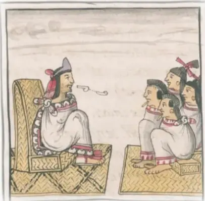 Lámina de códice: personaje importante sentado en un asiento de junco, con tocado rojo y adorno de labio, dirigiendo un discurso (voluta de canto) a un grupo arrodillado con mantas blancas y rojas.
