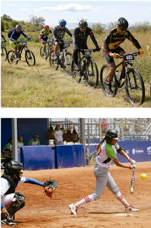 Grupo de ciclistas de montaña con casco recorriendo un camino de tierra, ilustrando actividades físicas al aire libre.