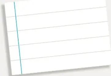 Hoja de cuaderno en blanco inclinada para escribir las respuestas.