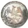 Fotografía del anverso de una moneda de plata: 'Proclama, Proclamación de Agustín de Iturbide, Ciudad de México, 24 de enero de 1823', diámetro 40 mm, Colección Casa de Moneda de México, Museo Numismático Nacional.