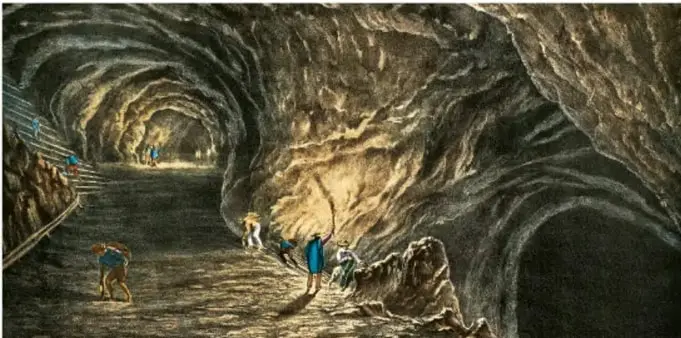 Grabado o pintura que muestra el interior de una mina colonial, con trabajadores extrayendo mineral y transportándolo por túneles.