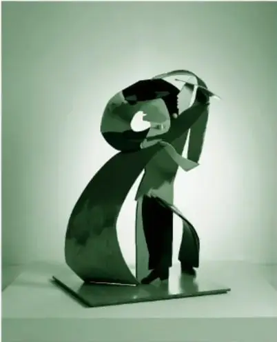 Escultura de dos figuras planas curvas que representan a una pareja bailando; la figura femenina se arquea hacia atrás sostenida por la masculina; pintada en negro, rosa, rojo, azul y amarillo, sobre una base rectangular.