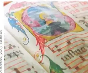 Imagen de un cantoral ilustrado con letras musicales y decoraciones coloridas.