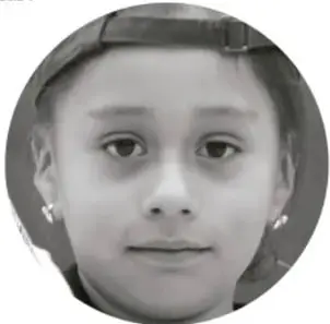 Fotografía de una niña con cubrebocas.