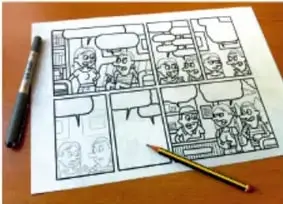 Fotografía de un boceto impreso de historieta con varias viñetas, sobre una mesa, acompañado de un lápiz y un rotulador.
