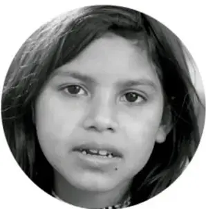 Fotografía de una niña sonriendo.