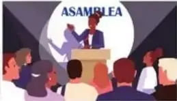 Asamblea con mujer indígena/afro hablando en público.