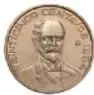 Fotografía del anverso de una moneda de veinticinco centavos con el retrato de Francisco I. Madero.