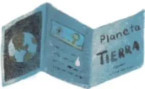 Folleto o tríptico doblado abierto con imágenes y texto sobre 'Planeta Tierra'.