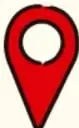 Icono de marcador de mapa rojo con círculo blanco al centro.