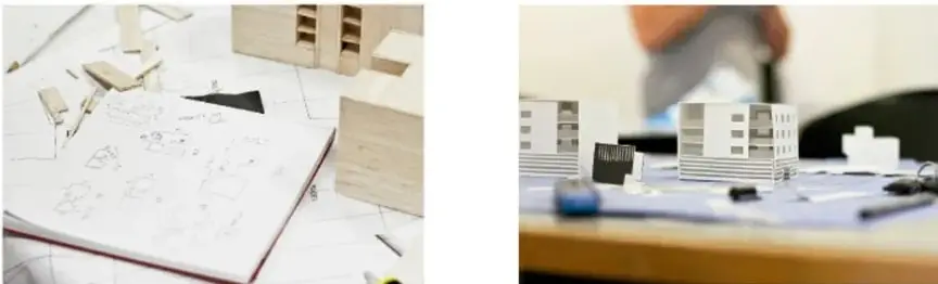Fotografía de un cuaderno con bocetos y piezas de cartón para armar una maqueta.