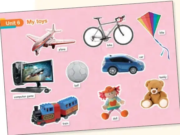 Lámina de la Unidad 6 'My toys' con imágenes de juguetes y sus nombres en inglés: plane, bike, kite, computer game, ball, car, train, doll, teddy.