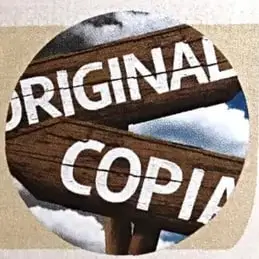 Imagen circular con un letrero que muestra las palabras 'Original' y 'Copia', relacionada con el plagio.