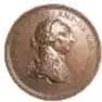 Fotografía del anverso de una medalla de bronce con el perfil de un personaje, ficha: Gerónimo Antonio Gil y Carlos III "Al Mérito", 58 mm, Museo Numismático Nacional.