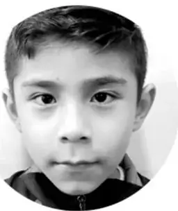 Fotografía en blanco y negro de un niño mirando de frente, acompañando la actividad 9.