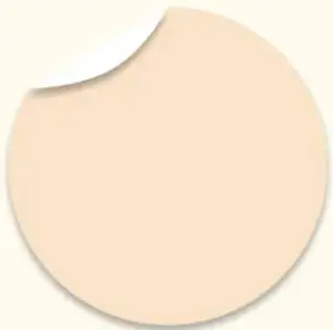 Círculo beige con esquina doblada, adorno gráfico.