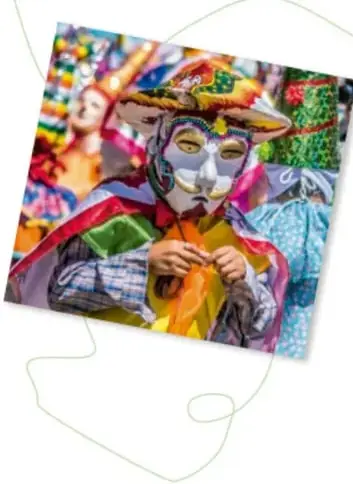 Dos niñas con el rostro pintado como calavera junto a una persona disfrazada de catrina: Día de Muertos.