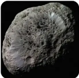 Fotografía de un asteroide, cuerpo rocoso irregular de color grisáceo.