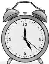 Reloj despertador analógico que marca aproximadamente las 4:20, símbolo del tiempo o de recordar.