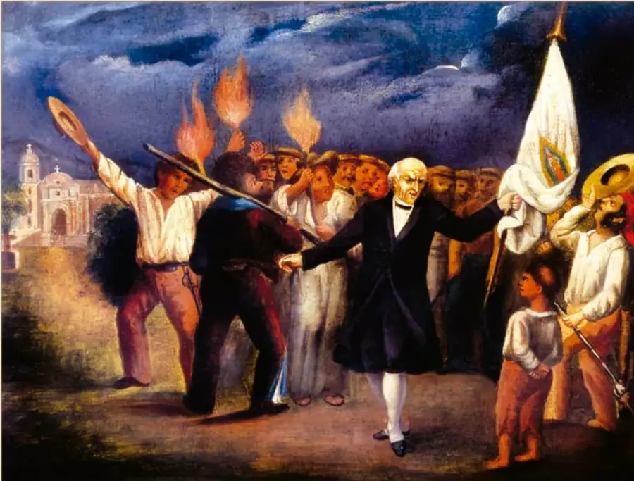 Óleo titulado 'El Grito de Dolores' (siglo XIX), del Museo Casa de Hidalgo: Miguel Hidalgo con brazo en alto frente a una multitud con antorchas, bandera e imagen religiosa, con la iglesia de Dolores al fondo.