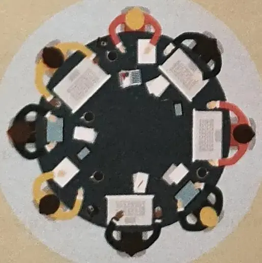 Ilustración de varias personas sentadas alrededor de una mesa, trabajando juntas en un equipo.