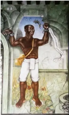 Pintura mural que representa a un hombre afrodescendiente con grilletes rotos en las muñecas, símbolo de libertad.