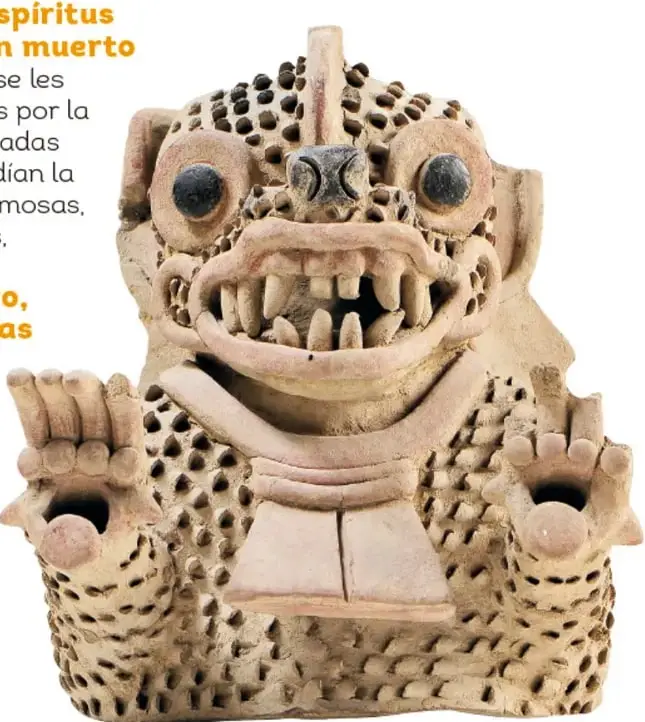 Urna o figurilla de barro que representa a un ser con boca enorme llena de colmillos, ojos saltones de obsidiana, cuerpo cubierto de perforaciones en puntas de cono y dos manos levantadas con las palmas abiertas.