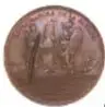 Fotografía de la medalla Fernando VII (anverso), de bronce, forma circular.