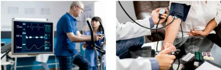 Monitor de signos vitales mostrando electrocardiograma y cifras (73, 64, 34) en una sala médica con personal de salud.