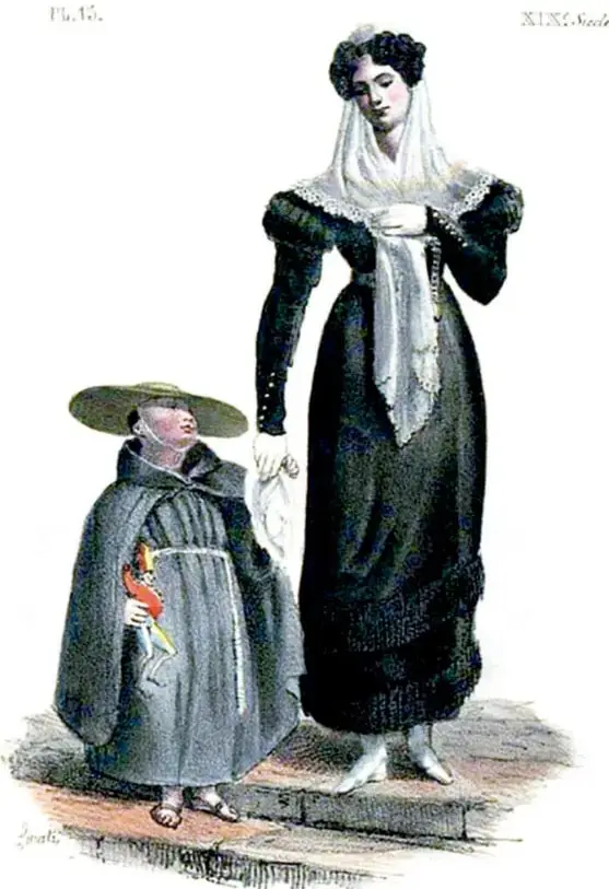Litografía coloreada de Claudio Linati (1828) titulada 'Joven dama'/'Dame élégante à Mexico': una mujer alta con vestido oscuro de mangas abullonadas, mantilla blanca de encaje y cabello recogido, sostiene la mano de una niña (o acompañante) con sombrero ancho de ala, capa gris y figura de juguete en la mano; ambas sobre un pedestal o escalón. Rótulo superior: 'XIX Siècle' y 'Pl. 15'.