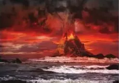 Paisaje de una erupción volcánica sobre el mar.