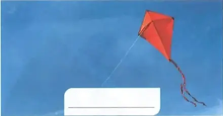 Cometa roja volando en un cielo azul; representa el uso de la energía del viento.