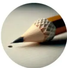 Punta de lápiz de grafito escribiendo sobre papel.