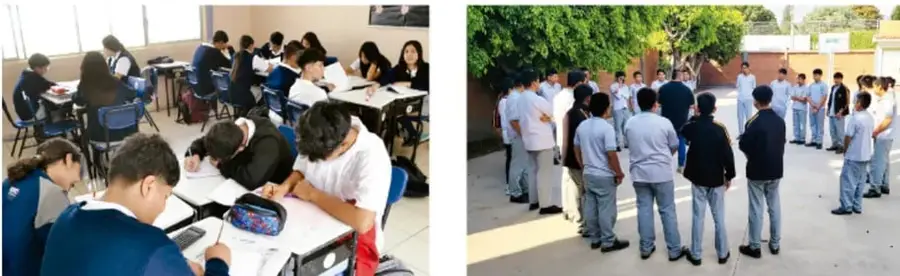 Fotografía de estudiantes trabajando en equipo alrededor de mesas en el aula, con materiales y cuadernos.