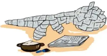 Ilustración de un ajolote de papel maché y materiales.