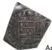 Fotografía del anverso de una Moneda Macuquina de Felipe V, 8 Reales, México, 1733, plata, diámetro 39 mm, Colección Casa de Moneda de México, Museo Numismático Nacional.