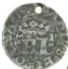 Fotografía del anverso de una moneda de plata de Carlos y Juana, Primer Tipo Sin Agua, 1/2 Real de México, con ficha del Museo Numismático Nacional.